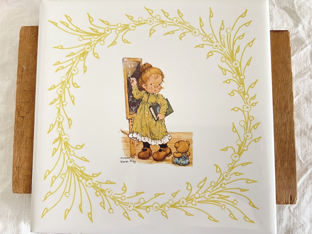 Sous-plat en céramique et poignées en bois Sarah Kay