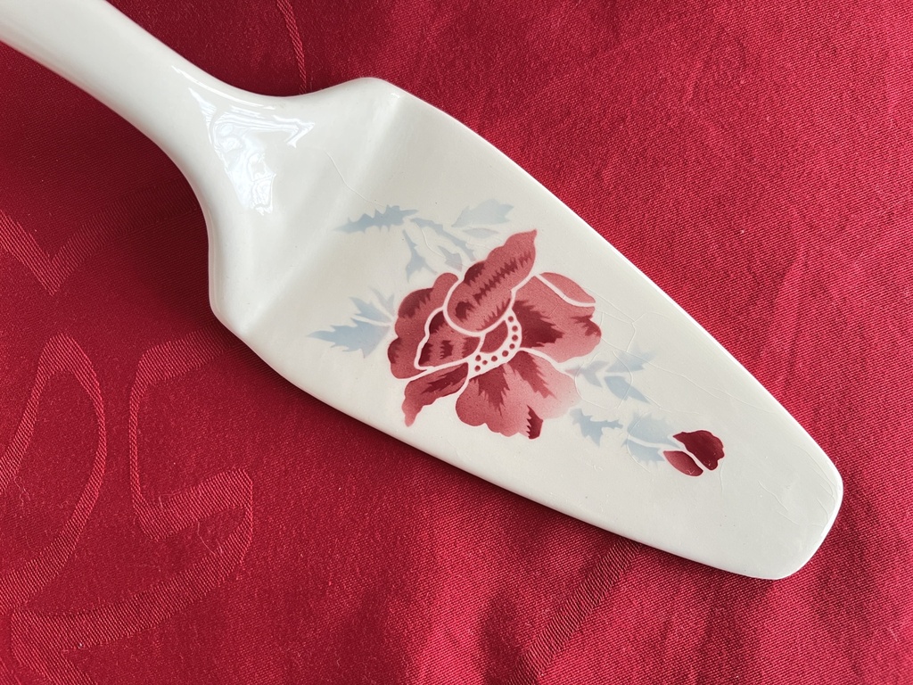 Pelle à tarte en céramique à fleurs rouges