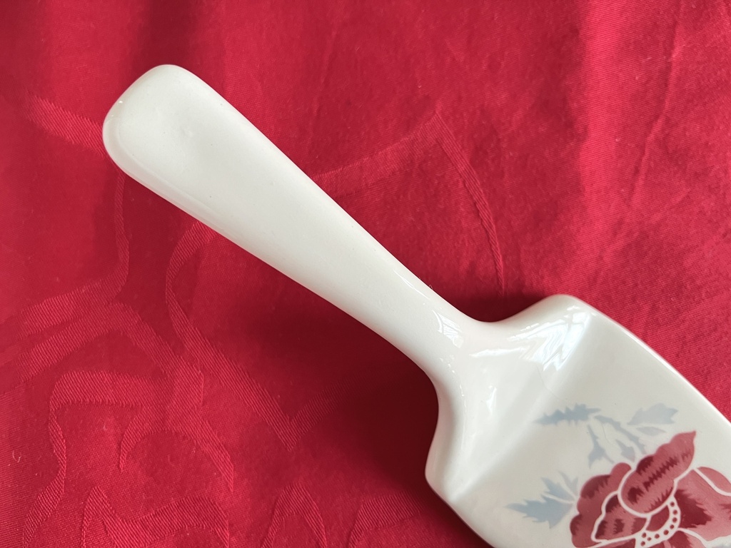 Pelle à tarte en céramique à fleurs rouges