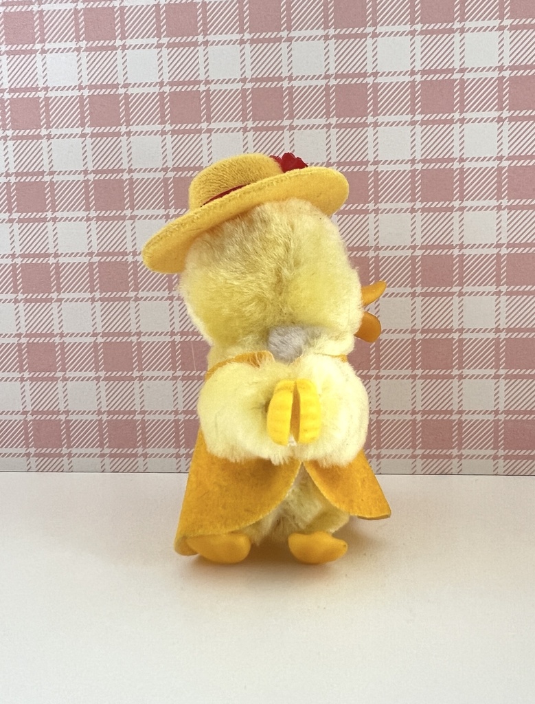 Peluche pince-doigt canard / poussin jaune à chapeau