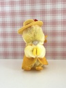 Peluche pince-doigt canard / poussin jaune à chapeau