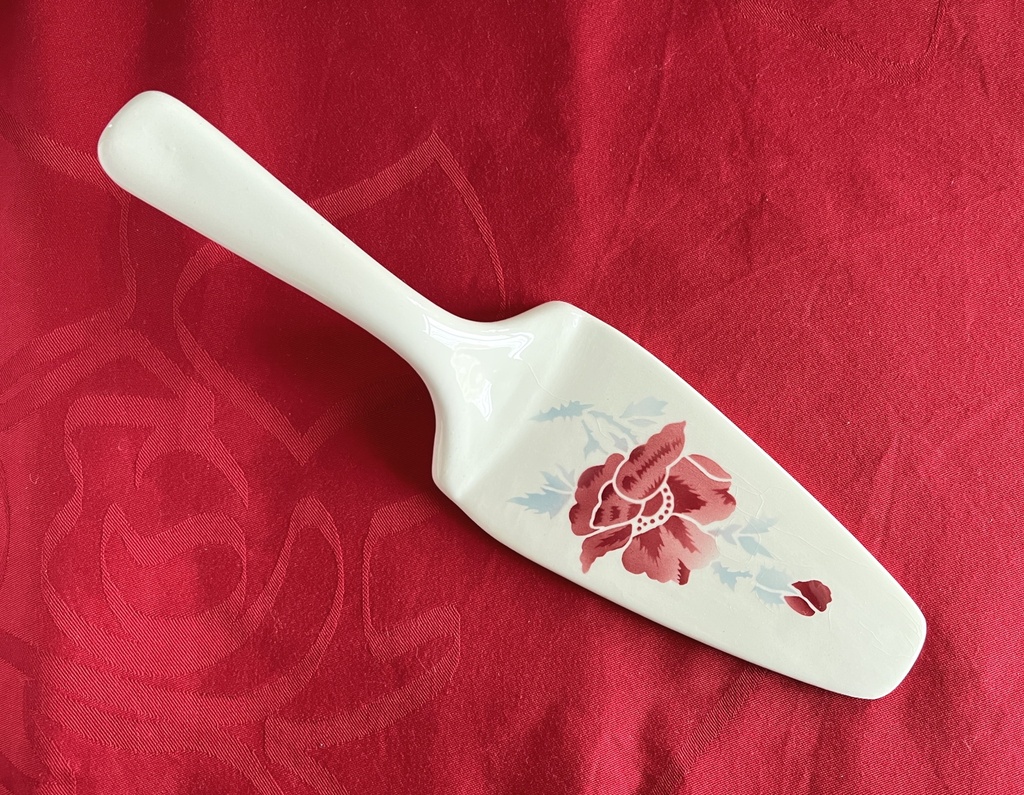 Pelle à tarte en céramique à fleurs rouges