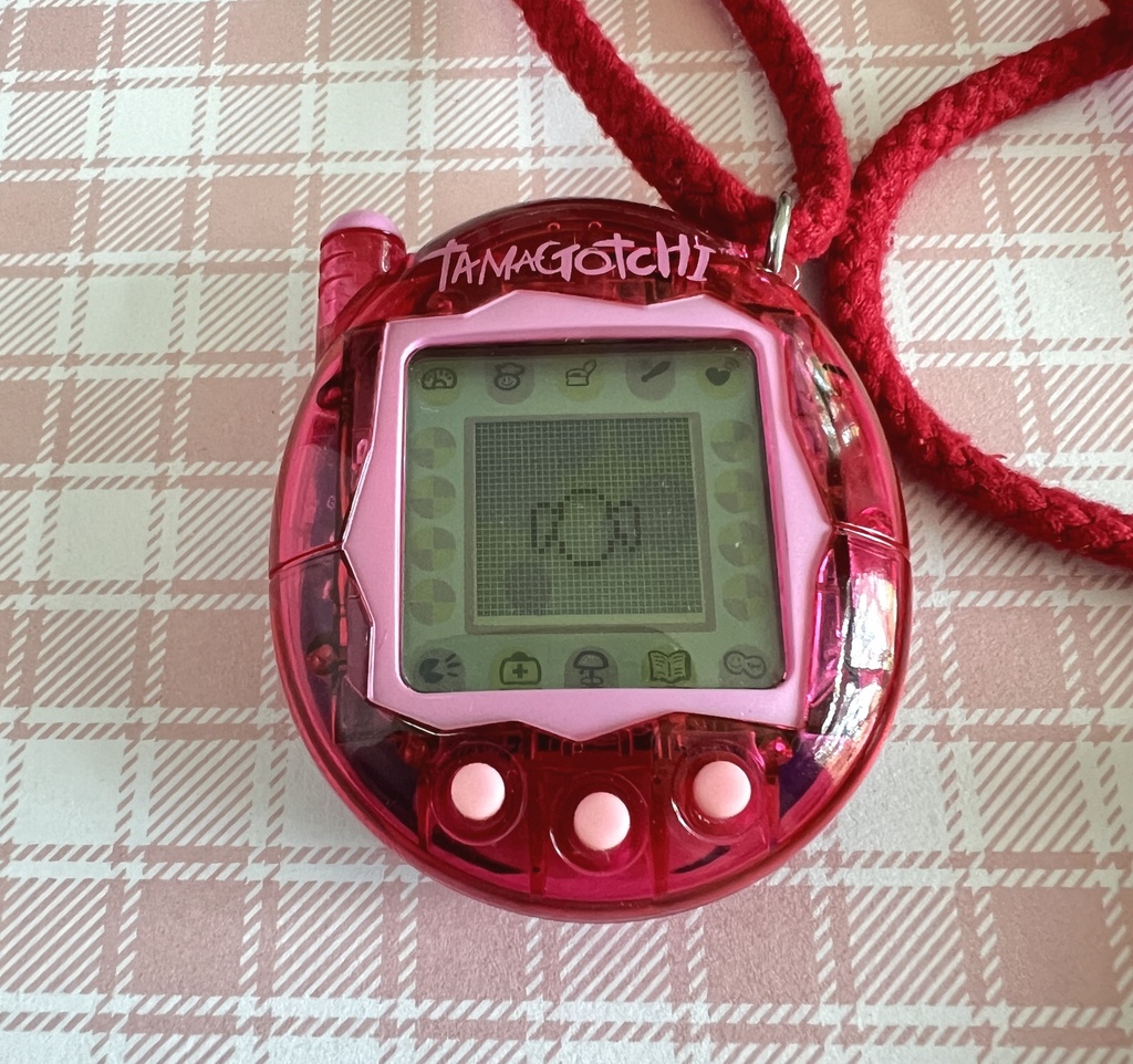 Old electronic game, Tamagotchi Plus, green, Bandai 2004
