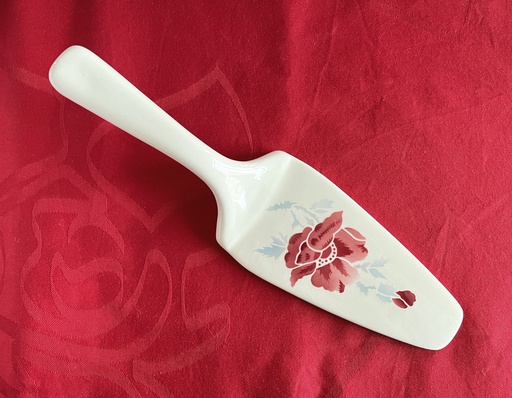 Pelle à tarte en céramique à fleurs rouges